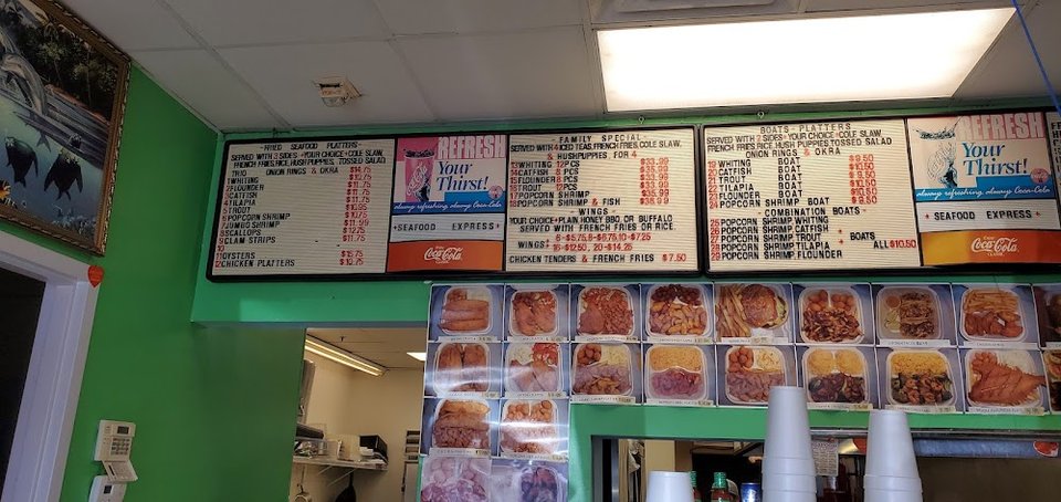 Entrees menu with fish-focused restaurant selections.
